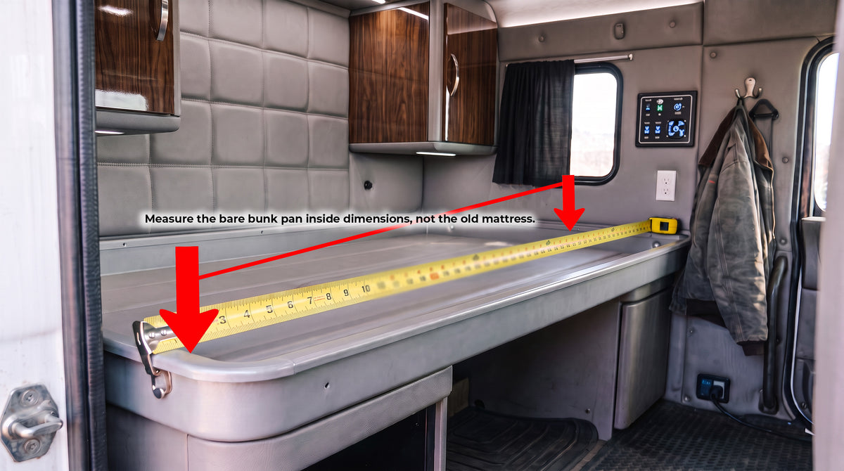 Tape measure across a bare semi truck sleeper cab bunk pan, measuring width for a custom mattress